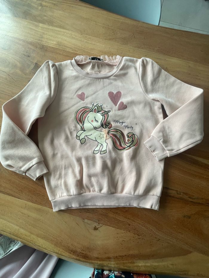 Pull taille 140