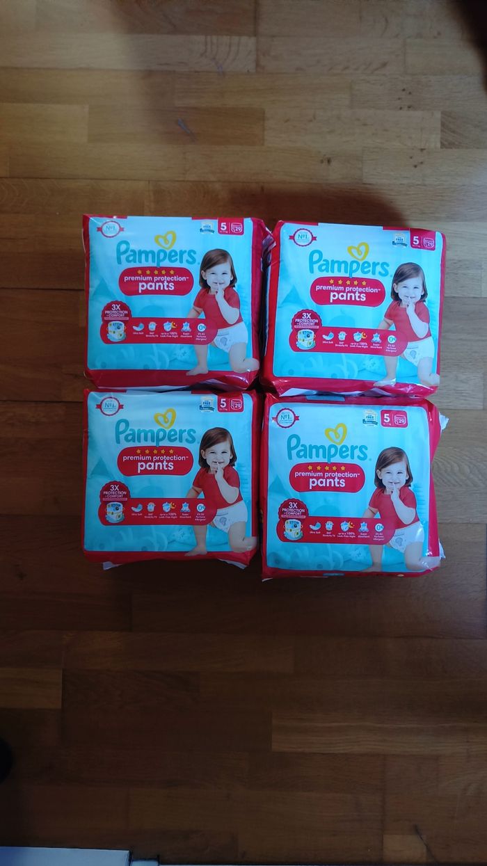 4 paquets de couches Pampers premium protection pants taille 5