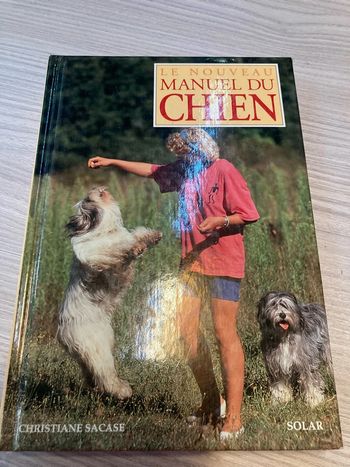Livre relié illustré le nouveau manuel du chien