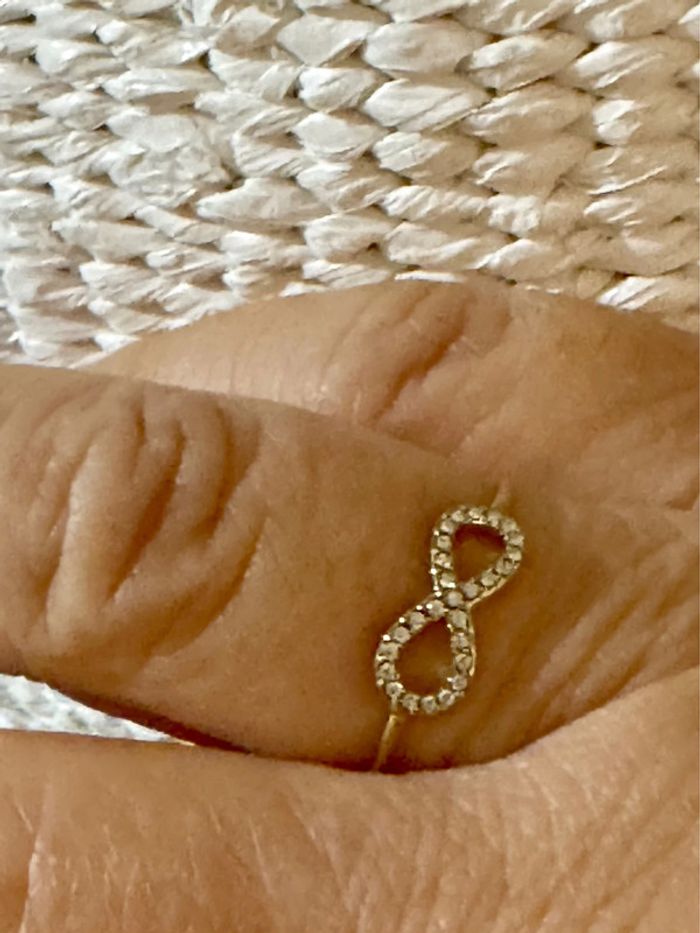 Bague réglable infini acier inoxydable or et zircons