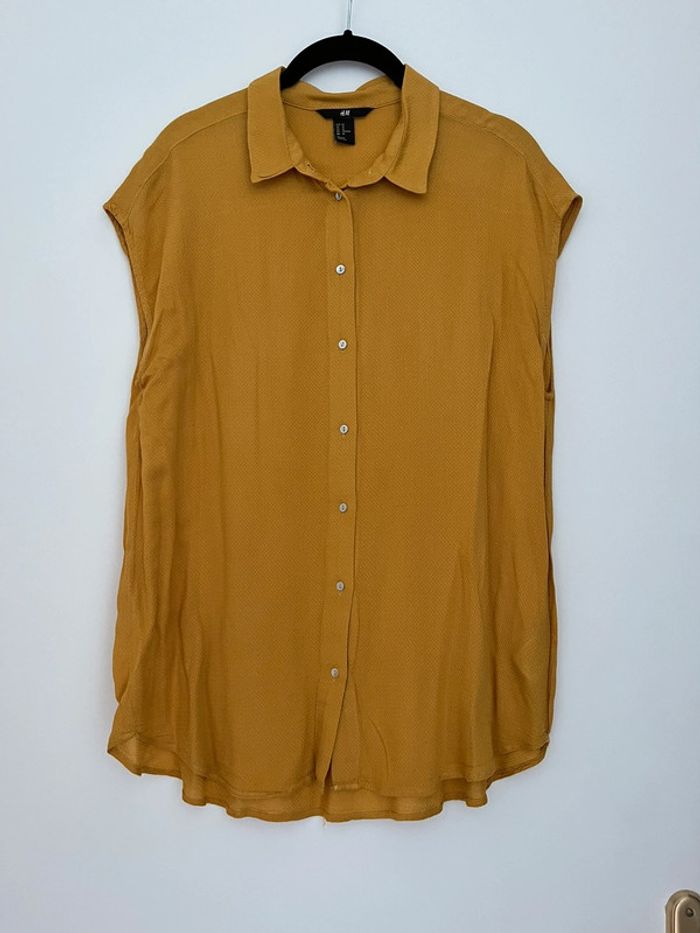 Chemise H&M sans manches taille 40