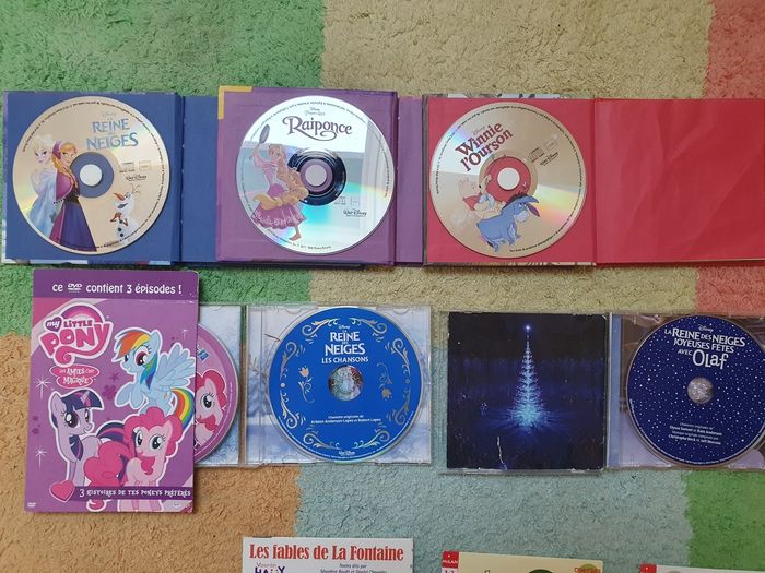 Lot de 3 livres histoire + 2 CD reine des neiges + 3 CD comptines  offerts- 3 ans et + -  TBE - photo numéro 2