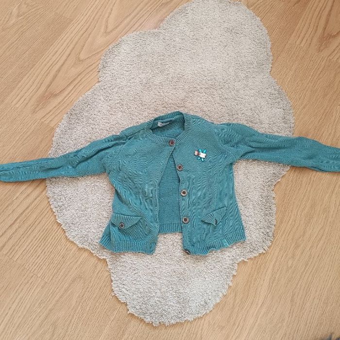 Gilet vert  avec broches