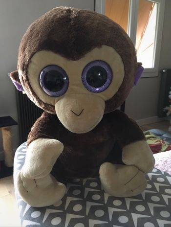 Grande peluche singe