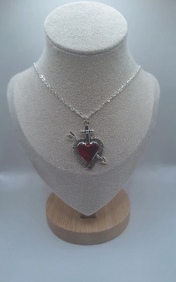Collier coeur planté