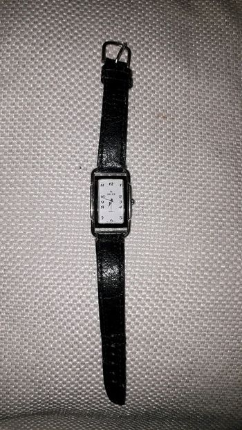 Orlex montre argentée et noire