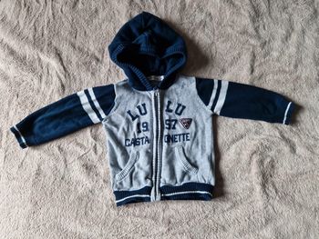 Gilet zippé à capuche