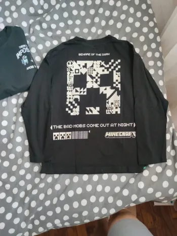 Deux noir t-shirts manches longues Zara