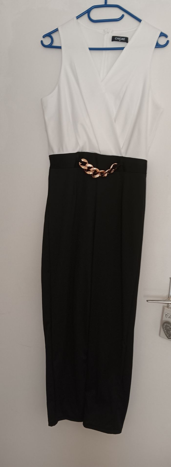 combinaison neuf jamaisnporte noir et blanc