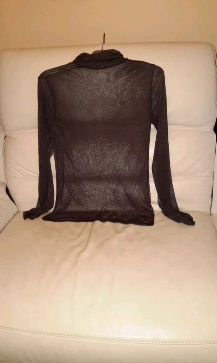 Haut à col roulé transparent