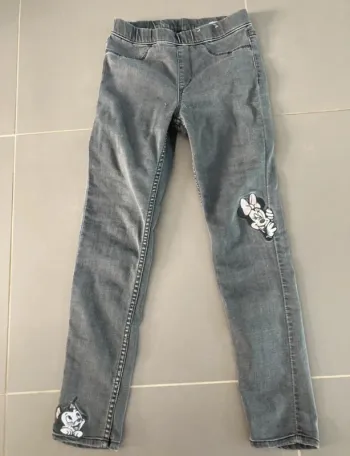 Tregging h&m 7-8 ans minnie et figaro en très bon état peu porté