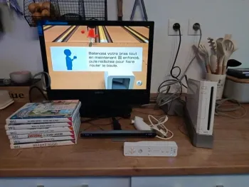 Wii avec câble manette 7 jeux