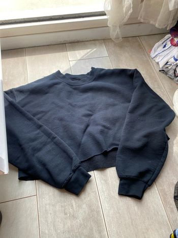 Pull noir, taille M