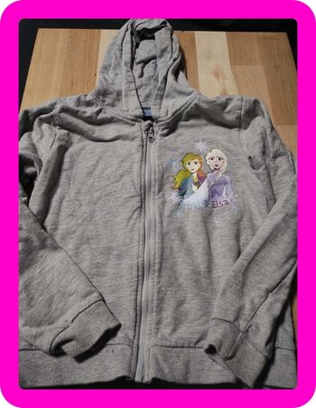 Gilet à capuche reine des neiges taille 7/8 ans en très bon état
