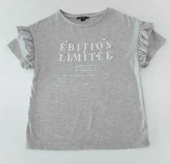 Tee-shirt fille taille 10 ans "édition limitée" en très bon état