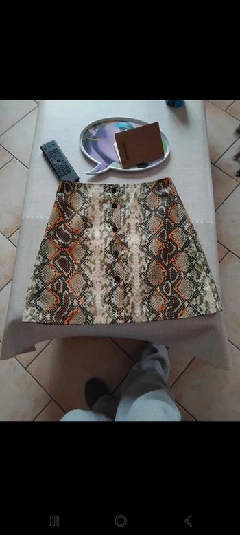 Mini jupe effet serpent