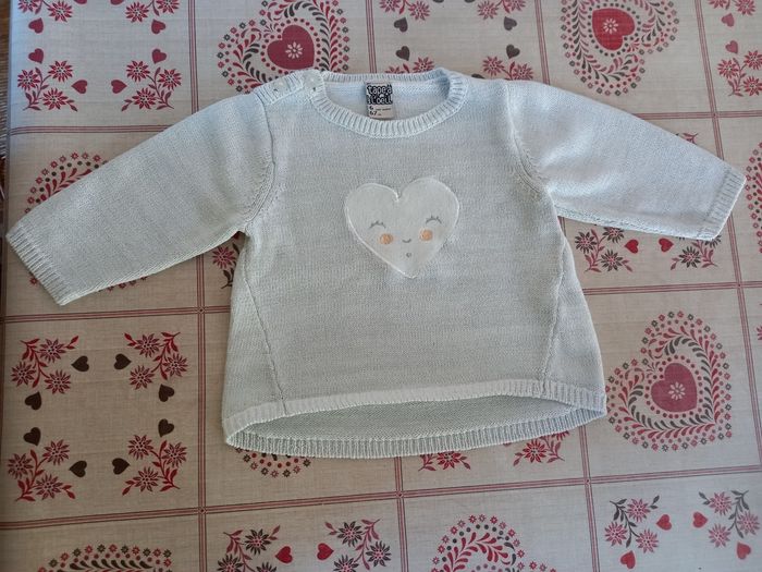 Pull manches longues.