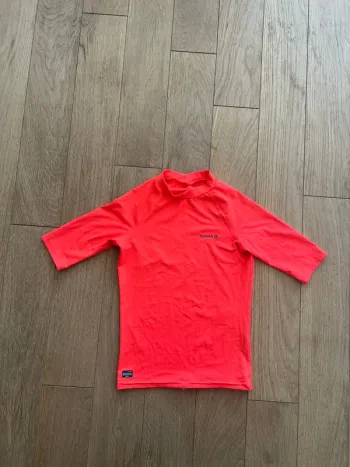 Tee shirt anti uv rose fluo décathlon olaian 12 ans très bon état
