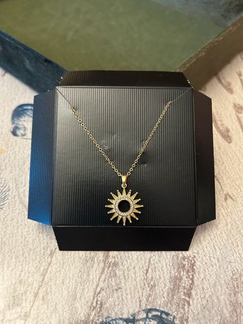 Collier pendentif soleil en acier inoxydable