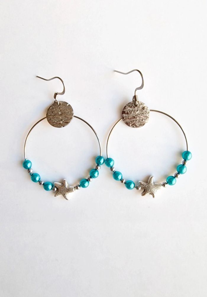 Boucle d'oreille étoile de mer