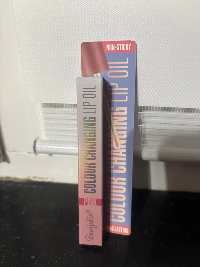 Huile à lèvres couleur changeante rose neuve