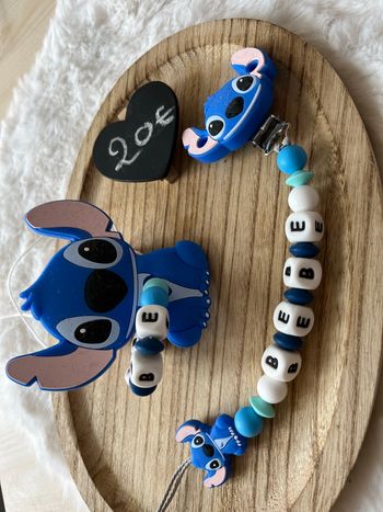 Attache tétine et anneaux de dentition