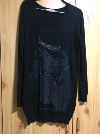 Pull long noire taille 38/40
