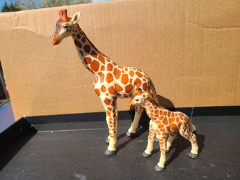 Figurine giraphe maman et son bébé