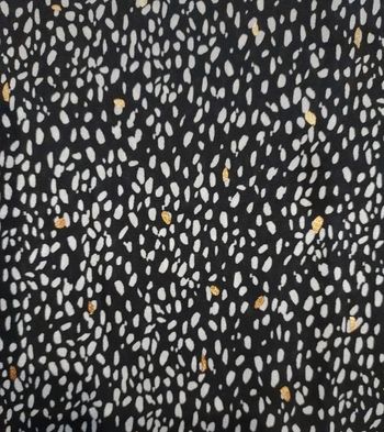 Robe noire blanche et dorée 38