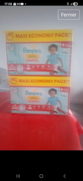 2 paquets de couches pampers premium taille 4 pants neuf