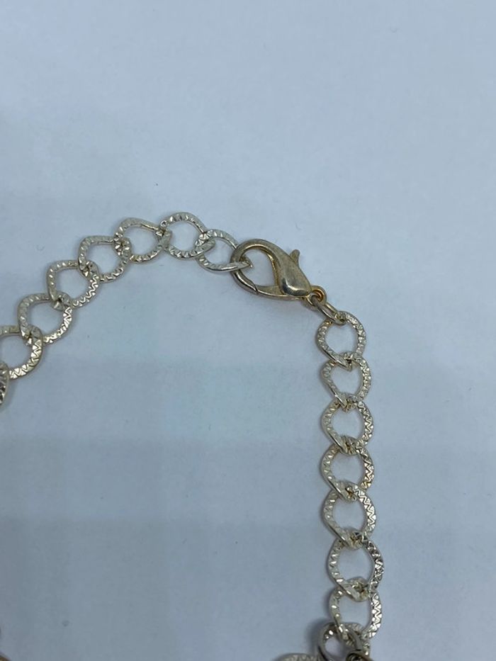 Bracelet fantaisie avec 3 coeurs rose pâle - photo numéro 3