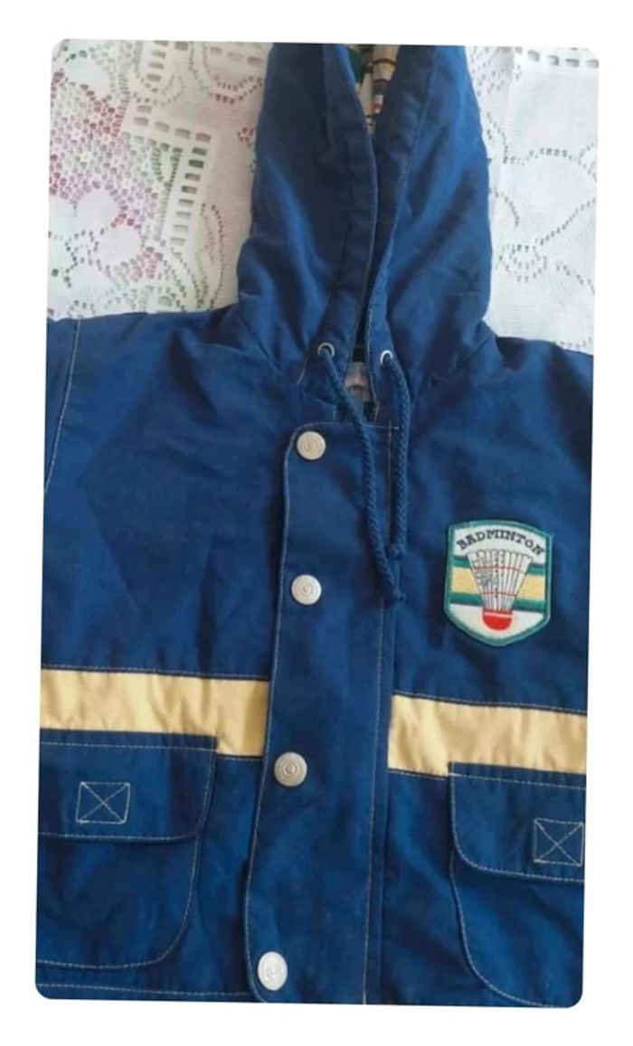 Manteau chaude - hiver, coupe-vent, bleu et jaune - en très bon état, taille 6 mois - photo numéro 2