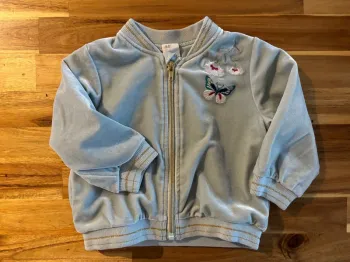 Veste velours avec fermeture éclair et fleurs brodées
