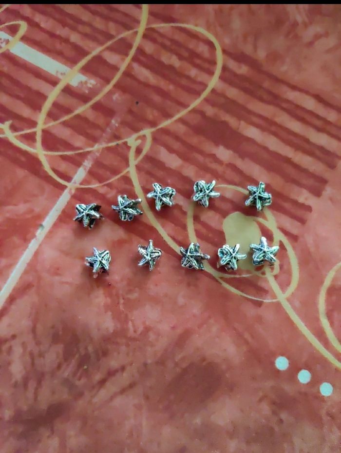 Lot de 10 perles argentées étoiles de mer