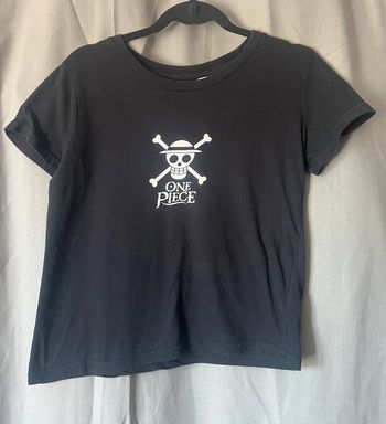 T-shirt court one pièce noir et blanc taille M ( taille petit ) très bon état