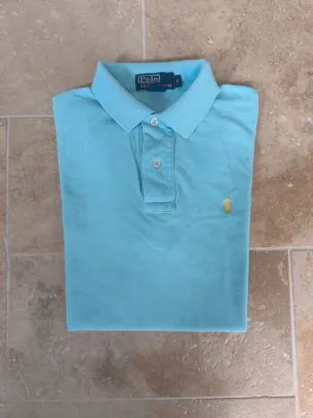 Polo Ralph Lauren homme S bleu clair logo jaune tâché