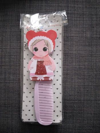 Peigne avec miroir neuf scelle