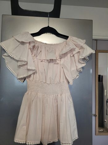 Haut rose pâle