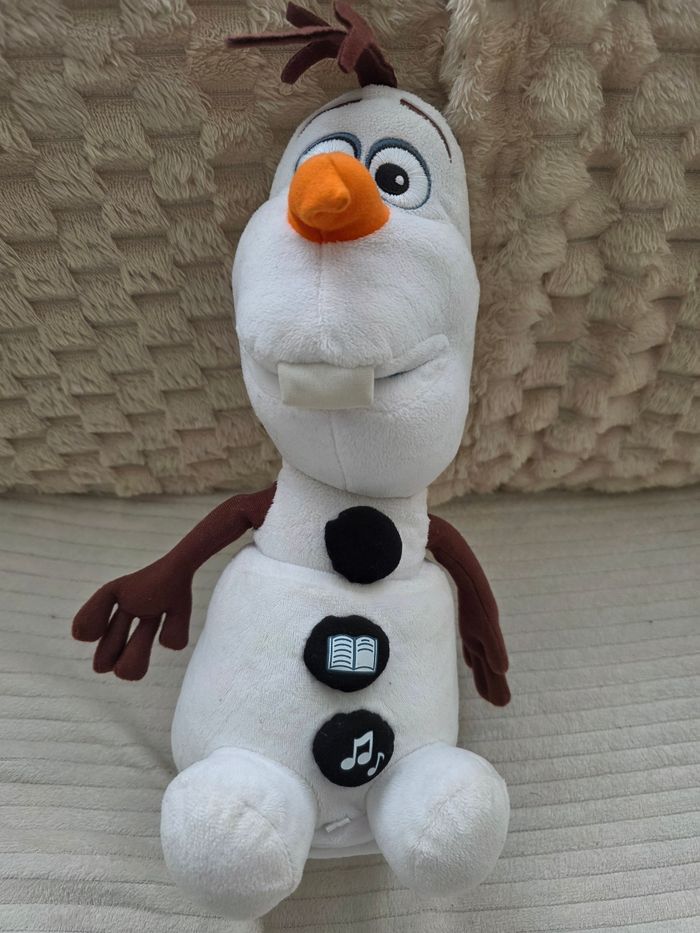 Peluche olaf  qui bouge chante et raconte  des histoires
