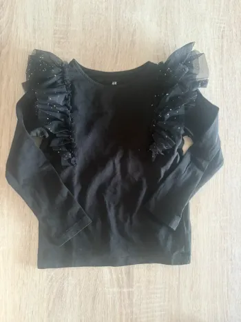 T-shirt à volants noir