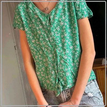 T shirt motif floral taille 34/14ans marque kiabi