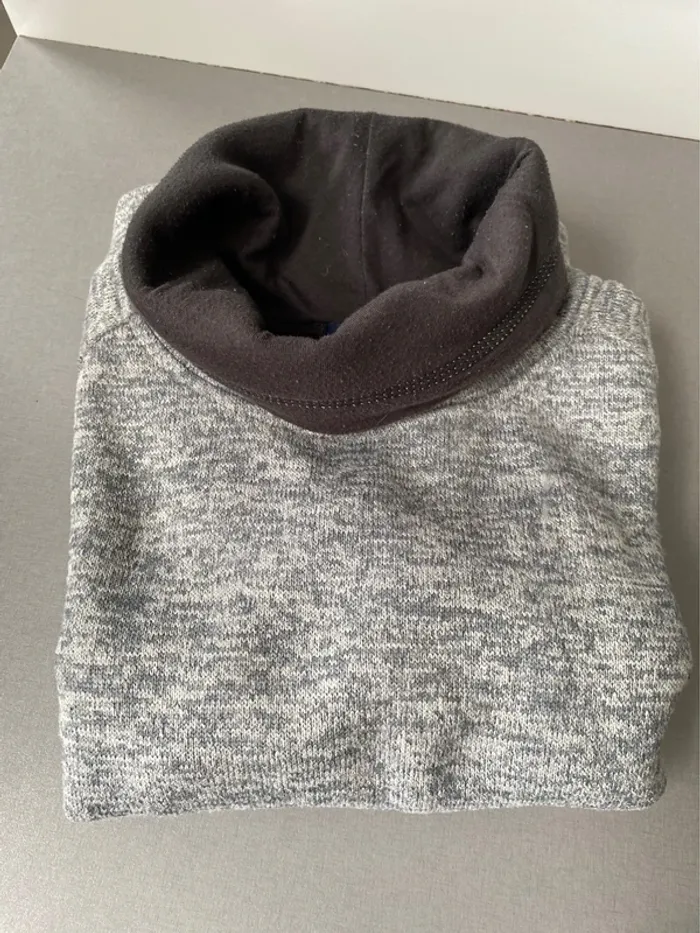 Pull col roulé