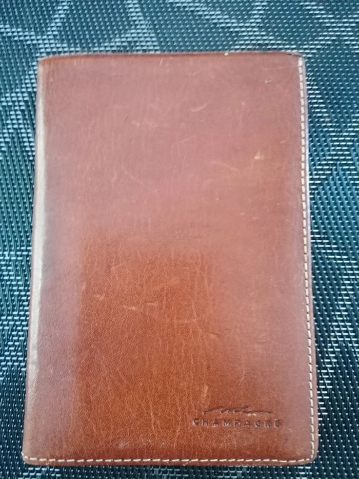 Portefeuille en cuir marron me champagne tbe