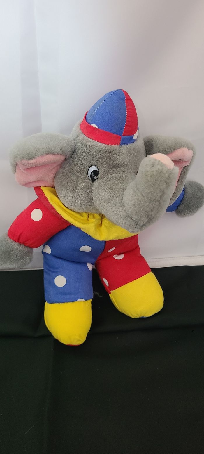 elephant jemini doudou gris rouge bleu jaune a pois peluche