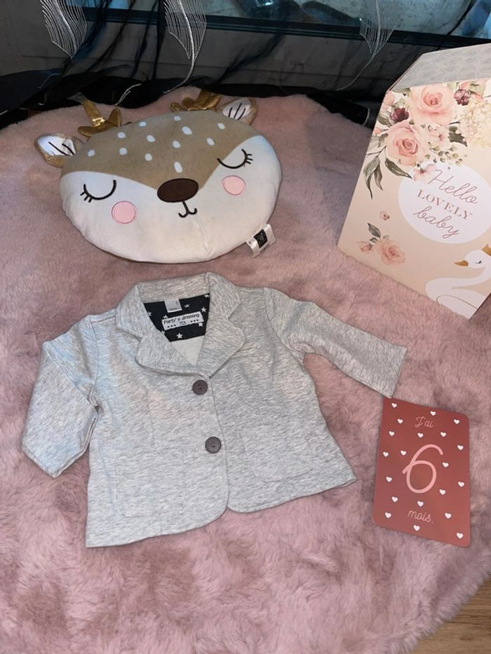 Jolie veste tex 6 mois
