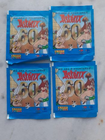 4 pochettes 60 ans d'aventures d'asterix neuves