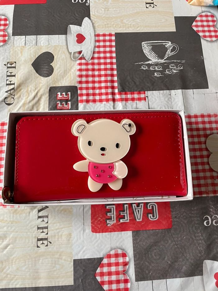Portefeuille rouge avec nounours