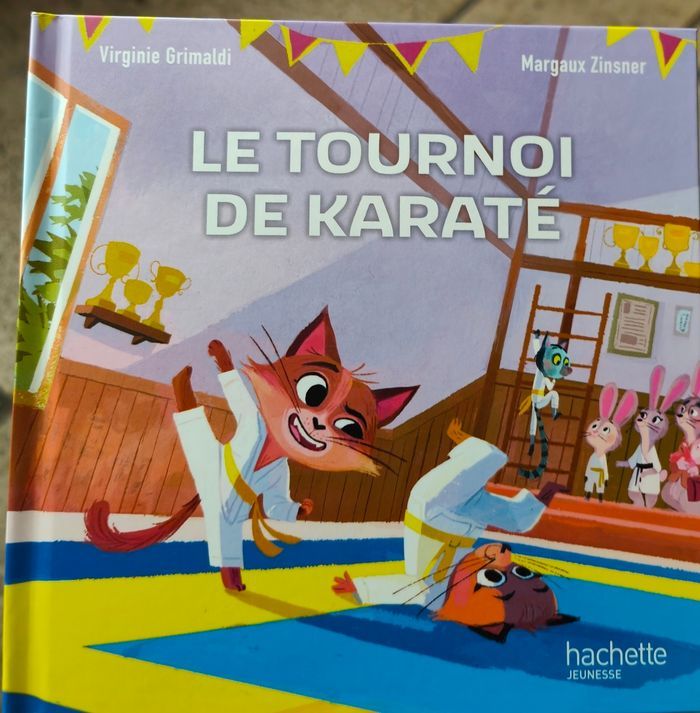 Livre  collection Mc Donalds Esprit Sportif 
éditions Hachette Jeunesse "Le tournoi de karaté" de  Virginie Grimaldi