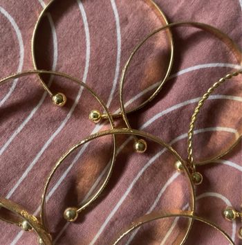 Lot 12 bracelets jonc dorés 