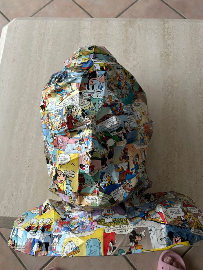 Sculpture, tête de bouddha, imprimé  Disney